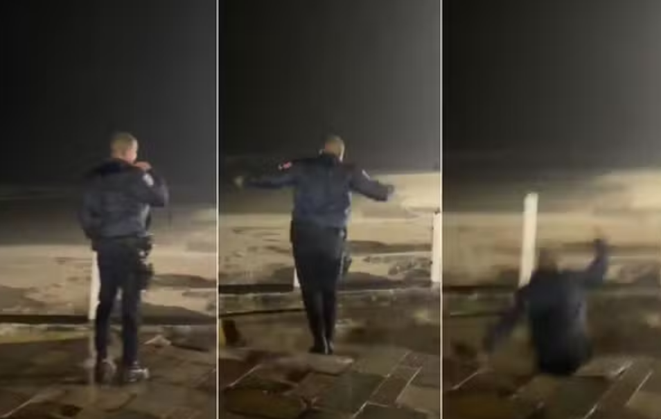 Guarda civil cai em cratera aberta na orla de Praia Grande durante forte temporal